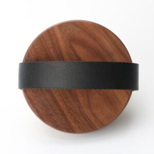 A premium boar bristle brush with a wooden handle, designed to exfoliate and rejuvenate skin for a natural glow.