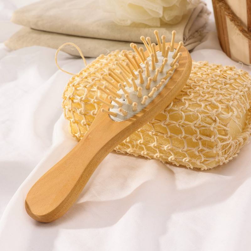 Bamboo bath set with wooden tub, bath tools, sponge, pumice stone, and brush made from non toxic body care materials.