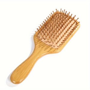 Bamboo comb and wood hairbrush with smooth wooden pins, designed for gentle detangling and dry hair care.
