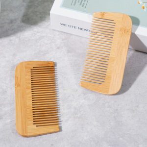 Compact bamboo hair comb with wide teeth and rounded edges, wide tooth wooden comb style for gentle detangling.