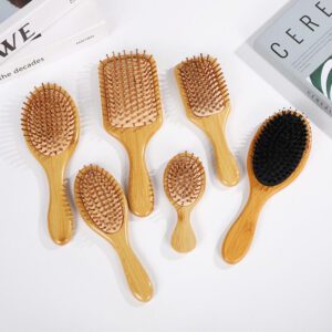 Bamboo hair brush with air cushion comb design and bamboo bristles, suitable for scalp massage and dry hair care.