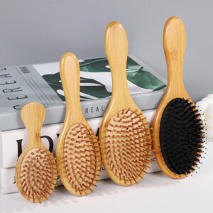 Bamboo hair brush with air cushion comb design and bamboo bristles, suitable for scalp massage and dry hair care.