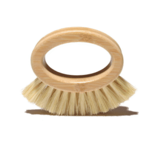 Round bamboo ring-handle kitchen scrub brush with natural sisal bristles on a white background, handheld dish and pot cleaning brush.
