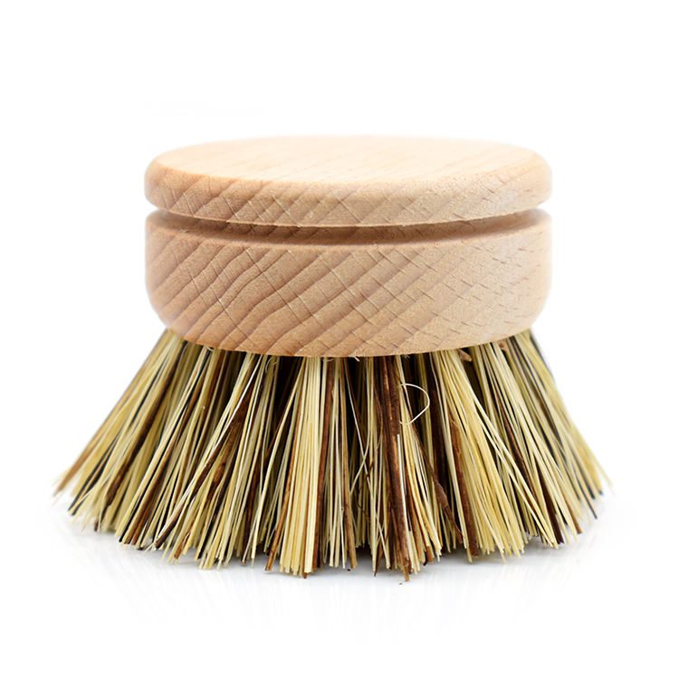 Round bamboo dish brush replacement head with sisal and palm fiber bristles on a white background