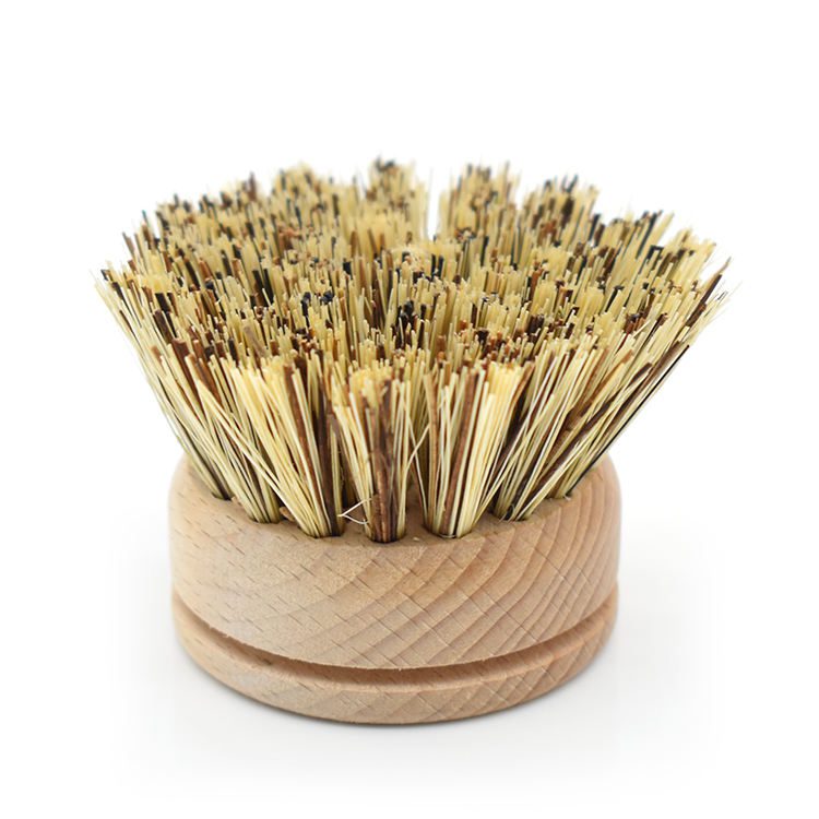 Round bamboo dish brush replacement head with sisal and palm fiber bristles on a white background
