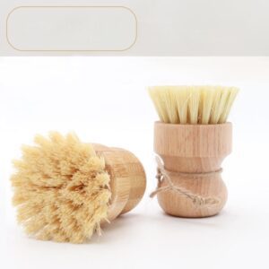 Bamboo dish brush with silicone bristles and ergonomic handle, perfect for cleaning dishes and kitchenware.