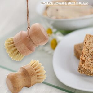 Bamboo dish brush with silicone bristles and ergonomic handle, perfect for cleaning dishes and kitchenware.