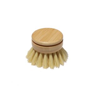 Round bamboo dish brush head with natural sisal bristles photographed on a clean white background