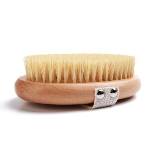 A body brush made of beech wood with boar bristles and a cotton strap, designed for skin exfoliation and dry brushing.