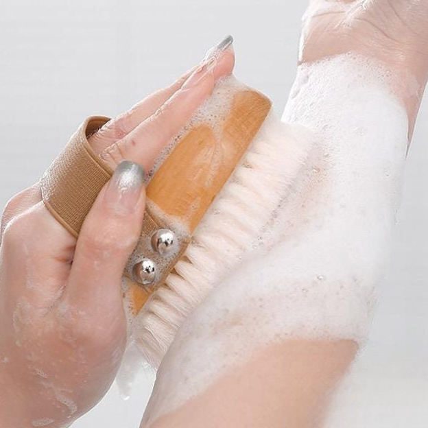 The best dry body brush made of beech wood and soft bristles, perfect for exfoliating and rejuvenating skin.