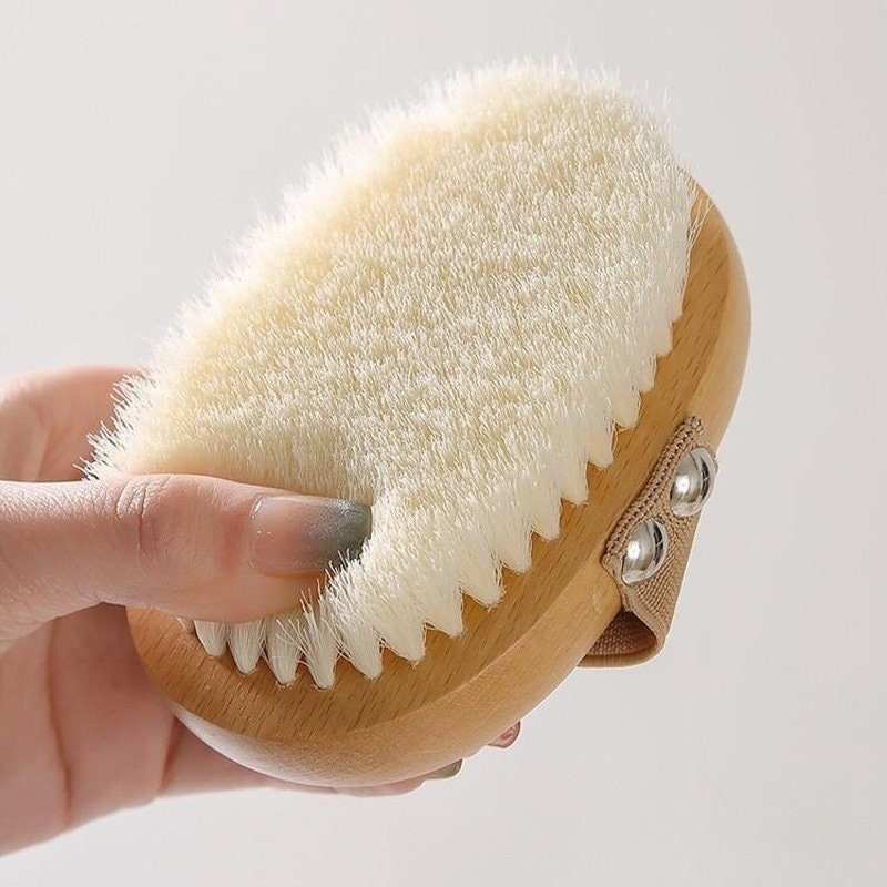 The best dry body brush made of beech wood and soft bristles, perfect for exfoliating and rejuvenating skin.