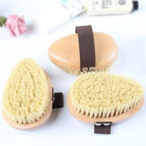 A high-quality boar bristle brush with a wooden handle, designed for effective exfoliation and skin rejuvenation.