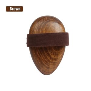 A high-quality boar bristle brush with a wooden handle, designed for effective exfoliation and skin rejuvenation.