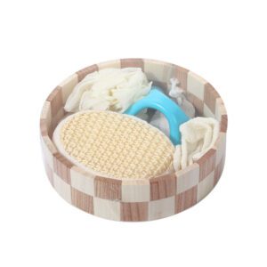 Body gift set displayed in a wooden bowl with exfoliating bath gloves, natural loofah, foot care pumice stone, and a trigger point massage tool.