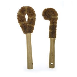 Bamboo-handled dish brush with three round coconut fiber scrub heads and a hanging hole, shown on a white background.