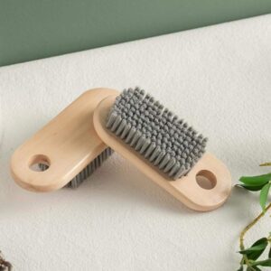 JEYGO handheld laundry brush with wooden handle and durable plastic bristles for effective clothes cleaning.