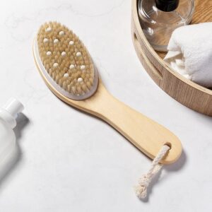 A bamboo brush with boar bristles and rubber tips, designed for exfoliating and massaging the body.