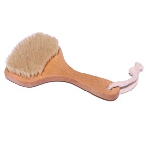 A natural bristle dry brush for body scrub massage, designed for exfoliating and rejuvenating the skin.