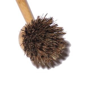 Long-handle bamboo dish scrub brush with a round head and mixed natural sisal and palm fiber bristles, shown on a white background.