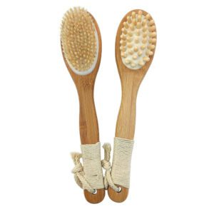A bath brush with a bamboo handle and natural pig bristles, designed for dry brushing and exfoliating the body.