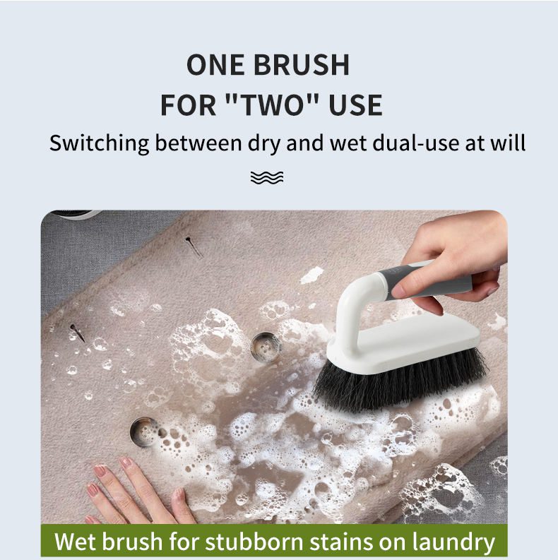 JEYGO plastic clothes cleaning brush with ergonomic handle and durable plastic bristles for fabric care.