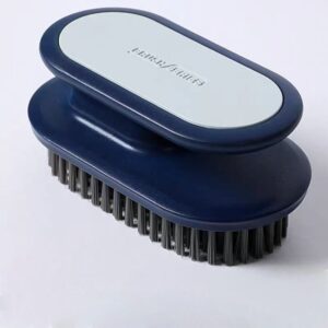 JEYGO clothing cleaning brush with ergonomic plastic handle, designed for easy stain removal during laundry care.