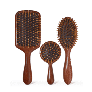 Sandalwood wooden massage comb with air cushion base, designed for head and scalp massage during daily hair care.