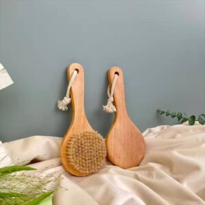 A wooden shower back brush with natural boar bristles, designed for dry brushing before or after your shower.