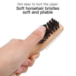 Wooden shoe cleaning brush with horsehair bristles and a white grooved rubber side, handheld design for shoe care.