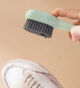 JEYGO soap dispenser brush with integrated liquid control, designed for efficient laundry cleaning and daily fabric care.