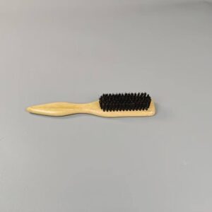 JEYGO beard styling brush with natural boar bristles and wooden handle, designed for shaping, straightening, and daily beard care.