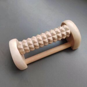 JEYGO wooden foot massager with textured roller for targeted sole stimulation.