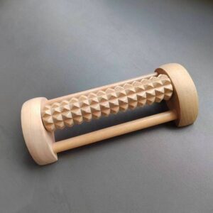 JEYGO wooden foot massager with textured roller for targeted sole stimulation.