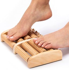 JEYGO wooden dual foot massage roller with multiple textured rollers for deep foot stimulation.