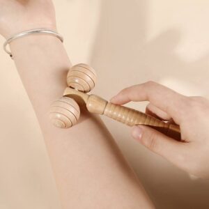 JEYGO wooden facial roller massager with dual rolling heads for targeted massage and relaxation.