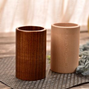 JEYGO wooden kitchen utensil holder designed for countertop use, suitable for spoons and everyday cooking tools.