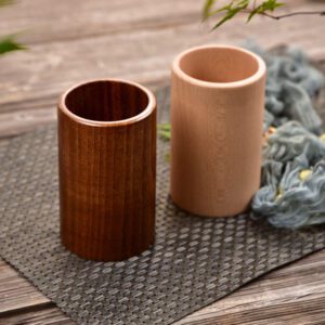 JEYGO wooden kitchen utensil holder designed for countertop use, suitable for spoons and everyday cooking tools.