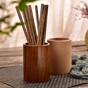 JEYGO wooden kitchen utensil holder designed for countertop use, suitable for spoons and everyday cooking tools.