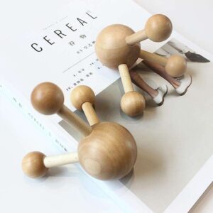 JEYGO wooden scalp massage comb with multi-point rounded heads, designed for head and body massage.