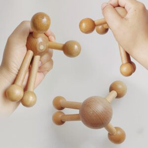 JEYGO wooden scalp massage comb with multi-point rounded heads, designed for head and body massage.