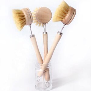 Long-handle wooden dishwashing brush with light bamboo handle, stainless steel neck, and round sisal bristle head on white background.