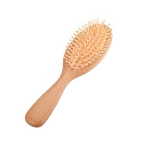 Massage comb with beech wood handle and hard rubber cushion, designed for scalp stimulation and daily grooming.
