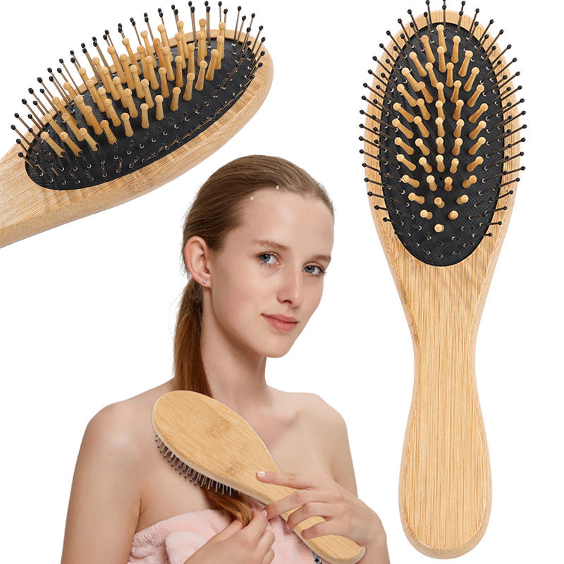 Wooden paddle hair brush with rubber cushion base, designed for daily scalp massage and smooth brushing.