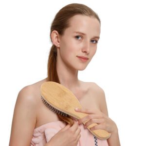 Wooden paddle hair brush with rubber cushion base, designed for daily scalp massage and smooth brushing.