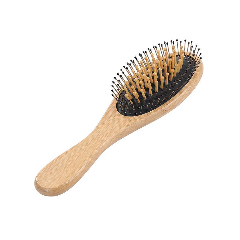Wooden paddle hair brush with rubber cushion base, designed for daily scalp massage and smooth brushing.