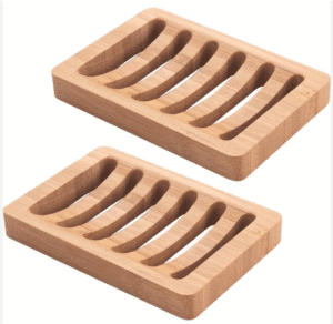 JEYGO bamboo soap dish with carved drainage slots, designed to keep soap dry and organized.