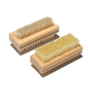 Bamboo nail brush with natural boar bristles, perfect for effective nail cleaning.