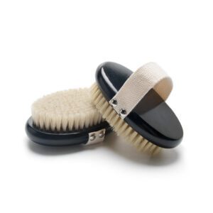 A sleek bath brush with handle, designed for exfoliating dry skin and promoting smooth, healthy skin.