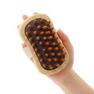 Handheld beech-wood scalp massager brush with rounded rubber massage nodes and a woven strap for comfortable grip.