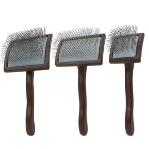 Wooden handle dog grooming brush with stainless steel pins, designed for effective pet hair removal and coat maintenance